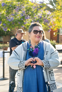 ILT Reylyn Cabrera, forming a heart with her fingers, in a sunny location